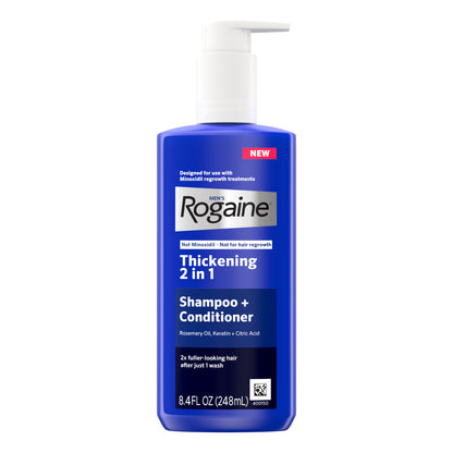 Bottle of Men's Rogaine Thickening 2 in 1 Shampoo + Conditioner on a white background.